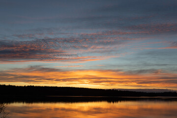 Glowing orange sunrise reflecting on the ocean