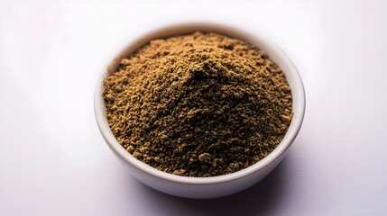 Earthy Ground Cumin Spice in Small Mound on White Background  Closeup of Rustic Powdery Cumin Seasoning Warm and Fragrant Culinary Ingredient for Cooking and Flavoring Dishes