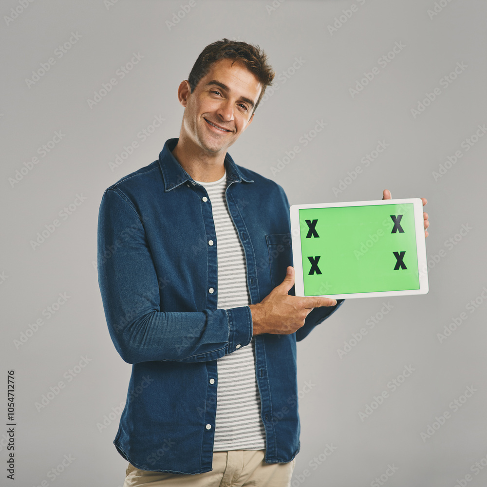Poster Portrait, green screen and man with tablet, promotion and happy person on gray studio background. Face, guy and model with tech, tracking markers and website info with internet, app and connection