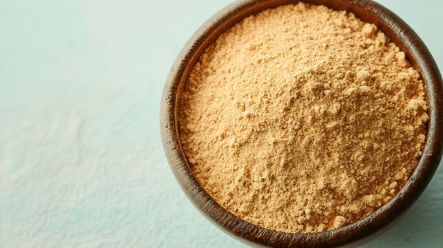 Close up shot of aromatic asafoetida or hing powder a traditional Indian spice known for its digestive and health benefits displayed on a soft