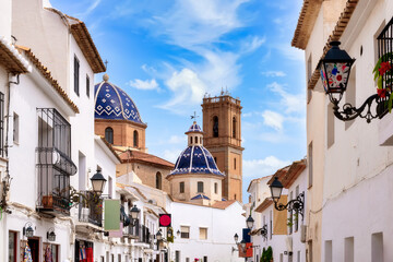 Cityscape of Altea with shops and church in background, Costa Blanca, Spain
