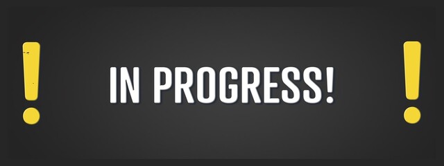 In Progress. A blackboard with white text. Illustration with grunge text style.