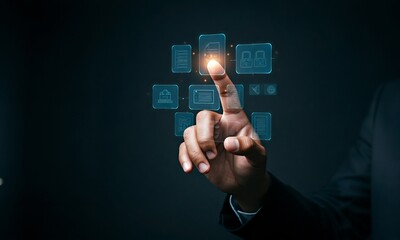 Person interacting with virtual interface of digital icons on a dark background.