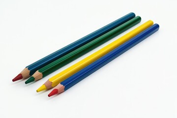 Fototapeta premium Three Colored Pencils on a White Surface