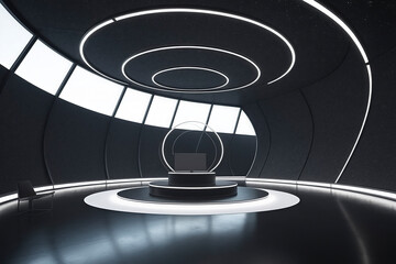 The dark interior technology booth has huge curved floor-to-ceiling Windows