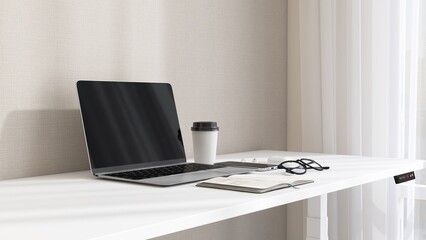 Desktop of modern white stand up desk with laptop computer, smartphone, earphone, notebook and eyeglasses in sunlight from window on beige wall for home office working, product background 3D