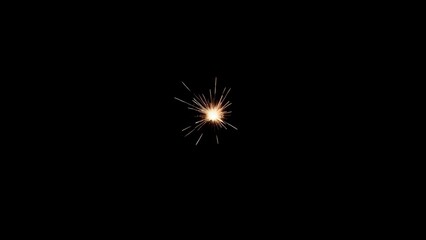 Fototapeta premium Spark of Inspiration on Dark Background