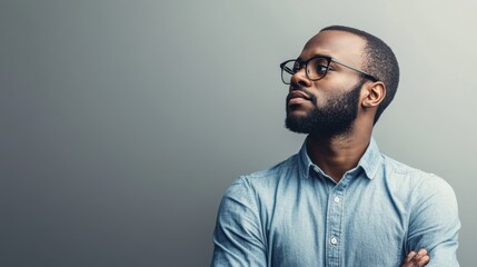 Obraz premium Thoughtful Man Standing Alone in Profile View