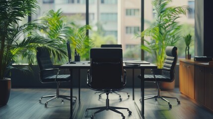 Modern office space with chairs and plants, designed for collaboration and productivity.