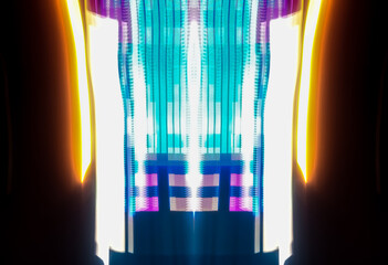 Abstract light art background with dynamic movement is the result of light painting photography capturing speed and energy with elegant lines of light.