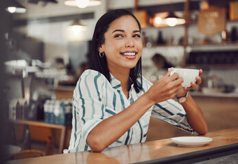 Tea, relax or woman in coffee shop with ideas for travel, holiday vacation or break in restaurant. Girl, thinking or happy customer drinking caffeine beverage in cafe or diner for latte or breakfast