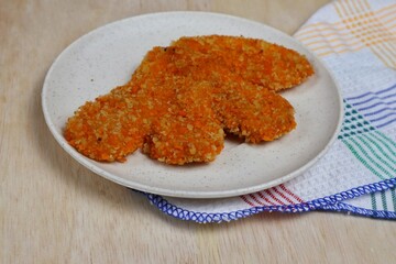 Fried bananas are a favorite snack in Indonesia, shaped like a fan, usually called fan fried bananas.