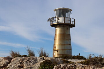 lighthouse on the coast of the sea