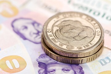 Closeup of detailed coins and colorful banknotes displayed together : Generative AI