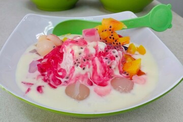 Fruit ice or fruit soup is a typical Indonesian fruit ice dessert. This cold and sweet drink is made from cut fruit mixed with shaved ice or ice cubes, and sweetened with liquid sugar or syrup.