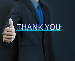 Businessman using laptop and showing thank you message on display. Concept of congratulation, appreciation. Presentation from digital technology. Thank you in business and gratitude.