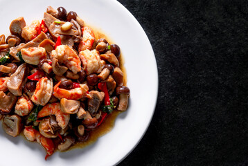 Stir-fried shrimp and mushrooms in oyster sauce. 