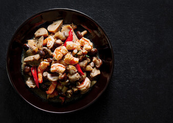 Stir-fried shrimp and mushrooms in oyster sauce. 