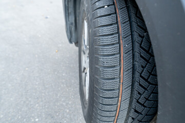 car vehicle tire showing full tread pattern