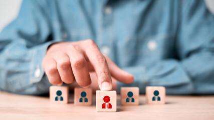 Naklejka premium Hr, HRM, Human resources management concept. Wooden cube block print screen person. teamwork concept.