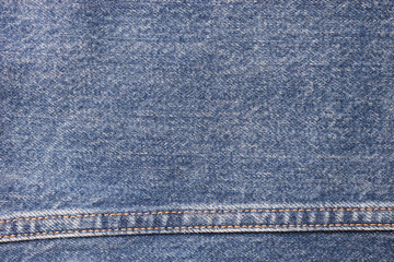 seam of blue denim texture background, jean fashion style