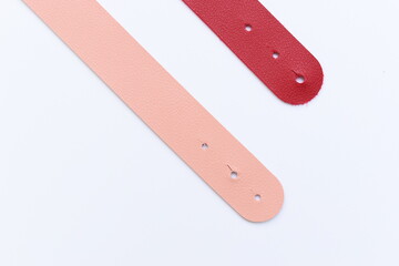 red and pink leather strap isolated on white background