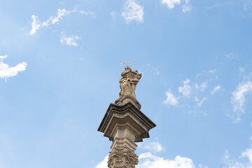 The top of the Marian Plague Column in the garden on Hradcanska Square in Prague in Czech Republic