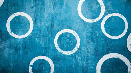 Artistic blue wall with white circular patterns, showcasing texture and design elements