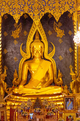 Background of morning light in the religious tourism area in Phitsanulok, Thailand. Wat Phra Si Rattana Mahathat Woramahawihan has an old church and beautiful Buddha statues.