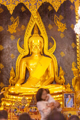 Background of morning light in the religious tourism area in Phitsanulok, Thailand. Wat Phra Si Rattana Mahathat Woramahawihan has an old church and beautiful Buddha statues.
