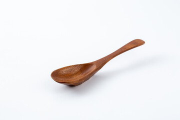 wooden spoon on white background