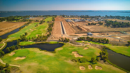 Golf course with nearby housing development