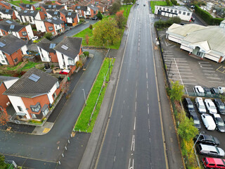 Aerial View of Manchester City During Autumn Season and Cloudy Day over England Great Britain. High Angle Drone's Camera Footage was Captured on October 29th, 2024