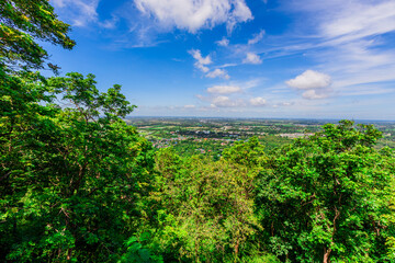 Background of the tourist attraction on the top of Suthep 2 mountain in Phitsanulok, Thailand, Khao Samo Khlang Pagoda, can see the beautiful scenery of mountains and rice fields.