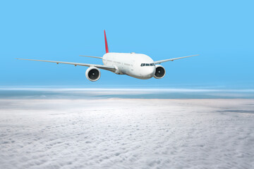 White passenger airplane flying in the sky amazing clouds in the background - Travel by air transport