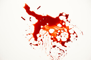blood  spatter and smears on a white backdrop
