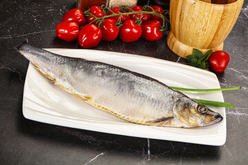Whole raw salted herring fish
