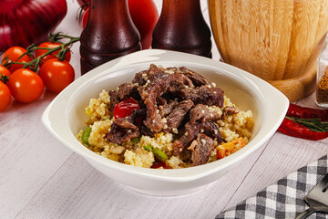 Traditional couscous with beef and vegetables