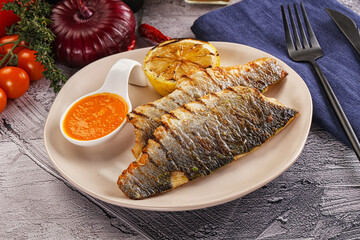 Grilled seabass fillet with lemon