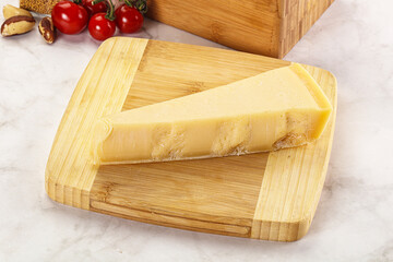 Hard parmesan cheese piece triangle