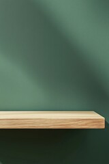 Empty light wood shelf on a sage green wall background for product display, 