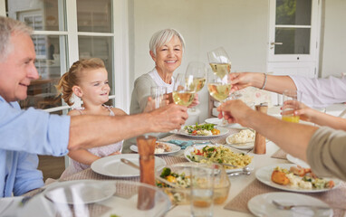 Happy family, lunch and cheers with wine glass in home patio for thanksgiving celebration. Parents, grandparents and children toast with drinks, food and generations at social gathering on holiday