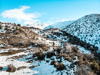 Snowy mountains as winter falls on the northern Golan Heights in Israel, with mount Hermon in the background