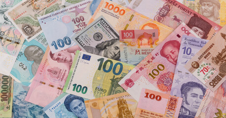 Many banknotes from different countries of the world of different denominations