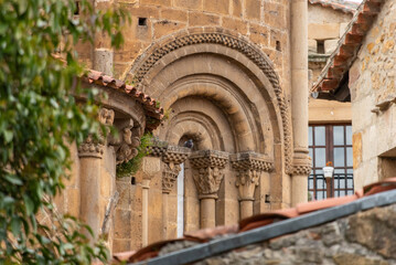 Architectural details of the romanesque Collegiate Church of Santillana or Colegiata de Santa Juliana in the medieval little town Santillana del Mar, Cantabria region in Northern Spain