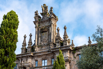 Roof decoration with coat of arms at the historic Monastery San Martino Pinario located in the center of Santiago de Compostela, seen from the roof of the cathedral, Galicia in Spain