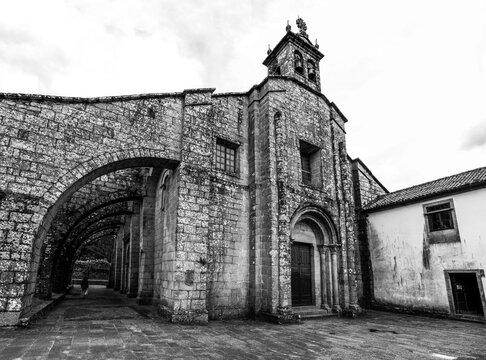 Ancient collegiate church Santa Maria de Sar in Santiago de Compostela with giant buttresses, subsequently built due to static problems