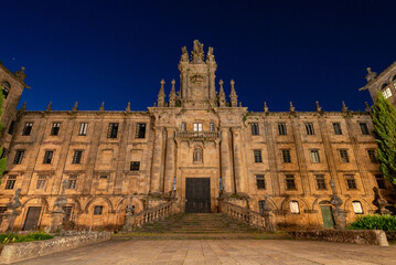 Baroque portal of the San Martino Pinario monastery at theImmaculata square in Santiago de Compostela at night, Galicia