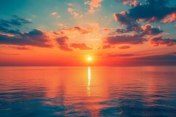 Obraz premium Fiery Sunset Over the Ocean