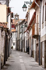 Picturesque narrow alley with small residential houses in the town center of Viana do Castelo